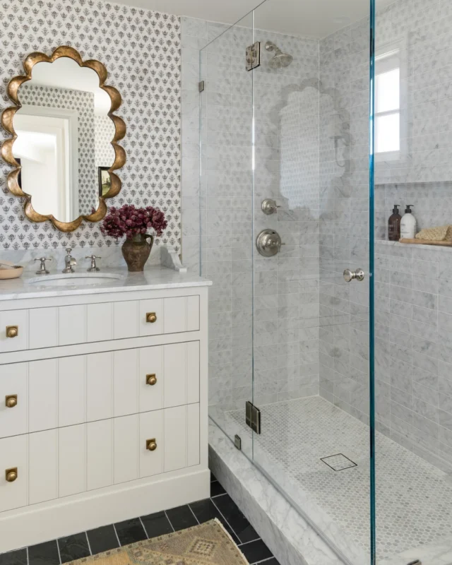 Small in size, big on style. This jewel-box bathroom layers pattern, texture, and timeless charm in all the right ways. #mgdxthecottage #mindygayerdesign 🤍 { Image by: @vlentine }⁣