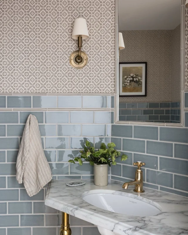 A small space dressed up with special details. The powder bath at #mgdxandover is a study in timeless materials paired with unexpected color and pattern. #mindygayerdesign { Image by: @vlentine }