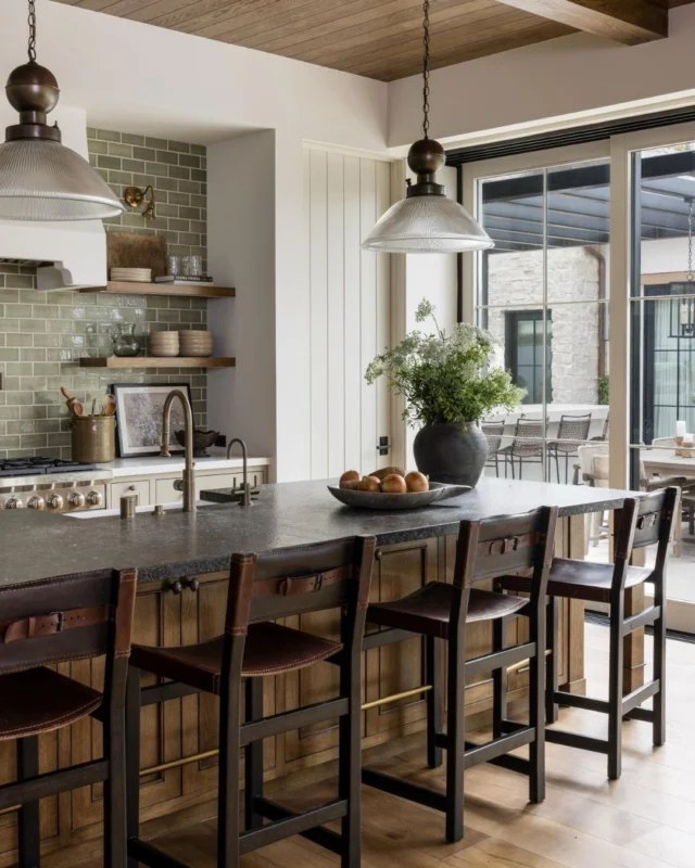 The kitchen that naturally became the heart of the home. At #mgdxpaseoclemente, this space was designed for the rhythm of everyday life - morning breakfasts, after-school snacks, and evenings when friends gather around the island and stay a little longer than planned. Layered materials, warm finishes, and a palette that plays with contrast give the room depth while still feeling welcoming and relaxed. See more of the kitchen and pantry on Substack! #mindygayerdesign { Image by: @vlentine, Architect: @brandonarchitects, Builder: @sayerandsons }